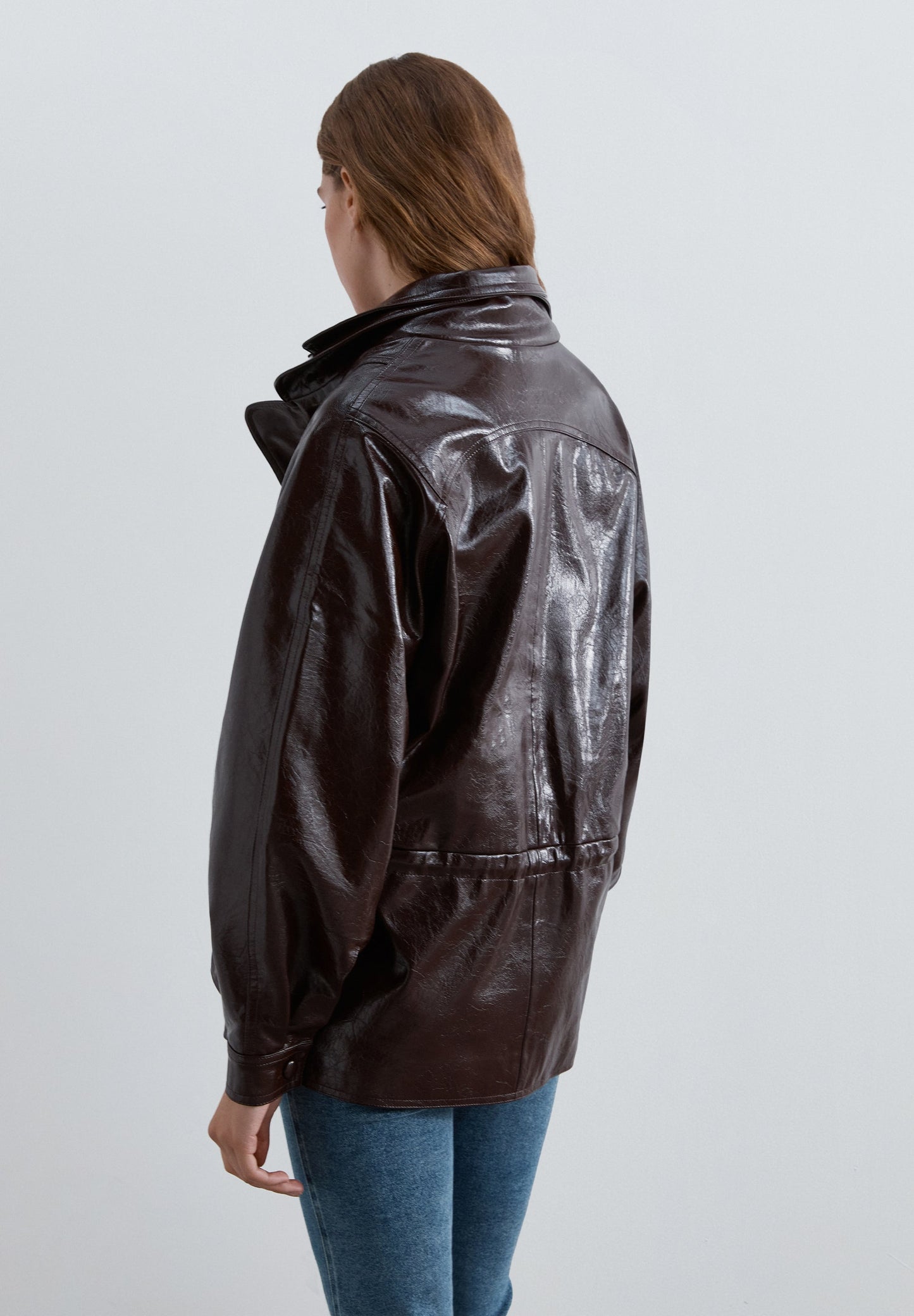 HIGH-NECKED JACKET WITH A PATENT-LEATHER FINISH
