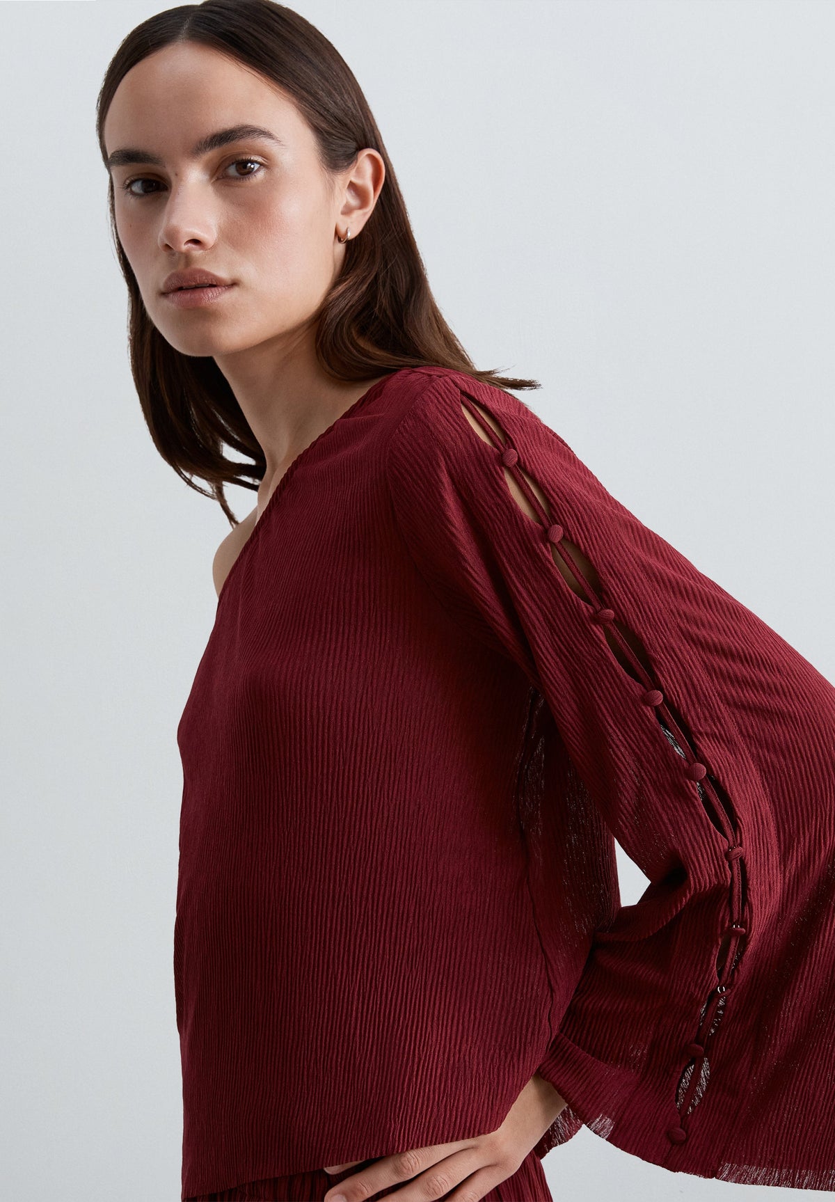 ASYMMETRIC TOP WITH CUT-OUTS