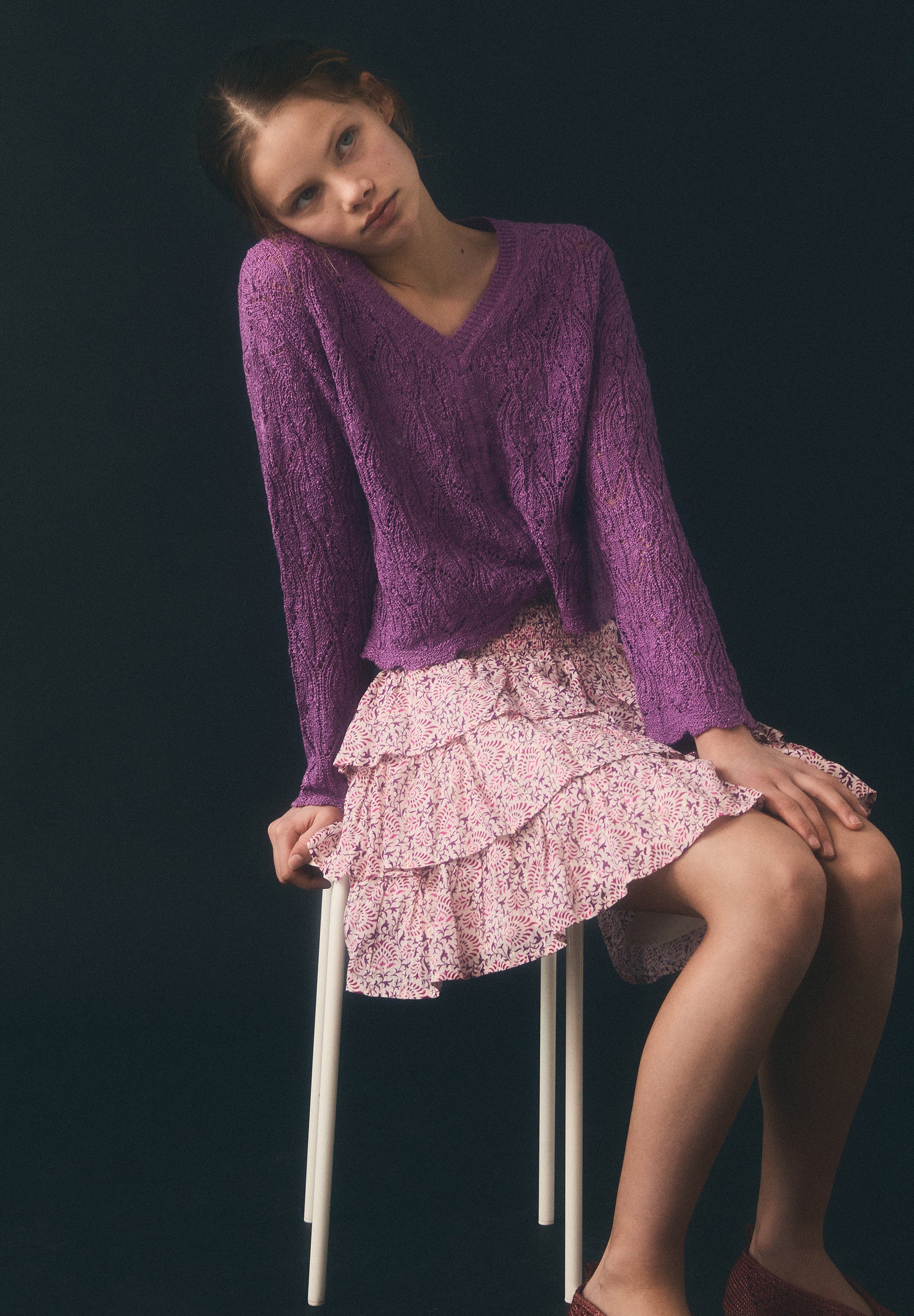 STRICKCARDIGAN MIT LOCHMUSTER