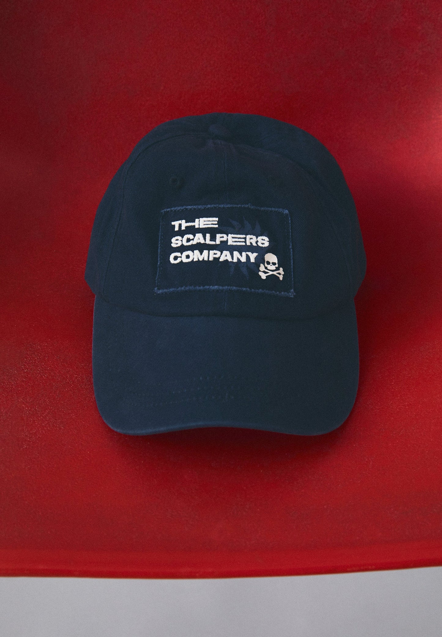 CAP WITH EMBROIDERED TEXT