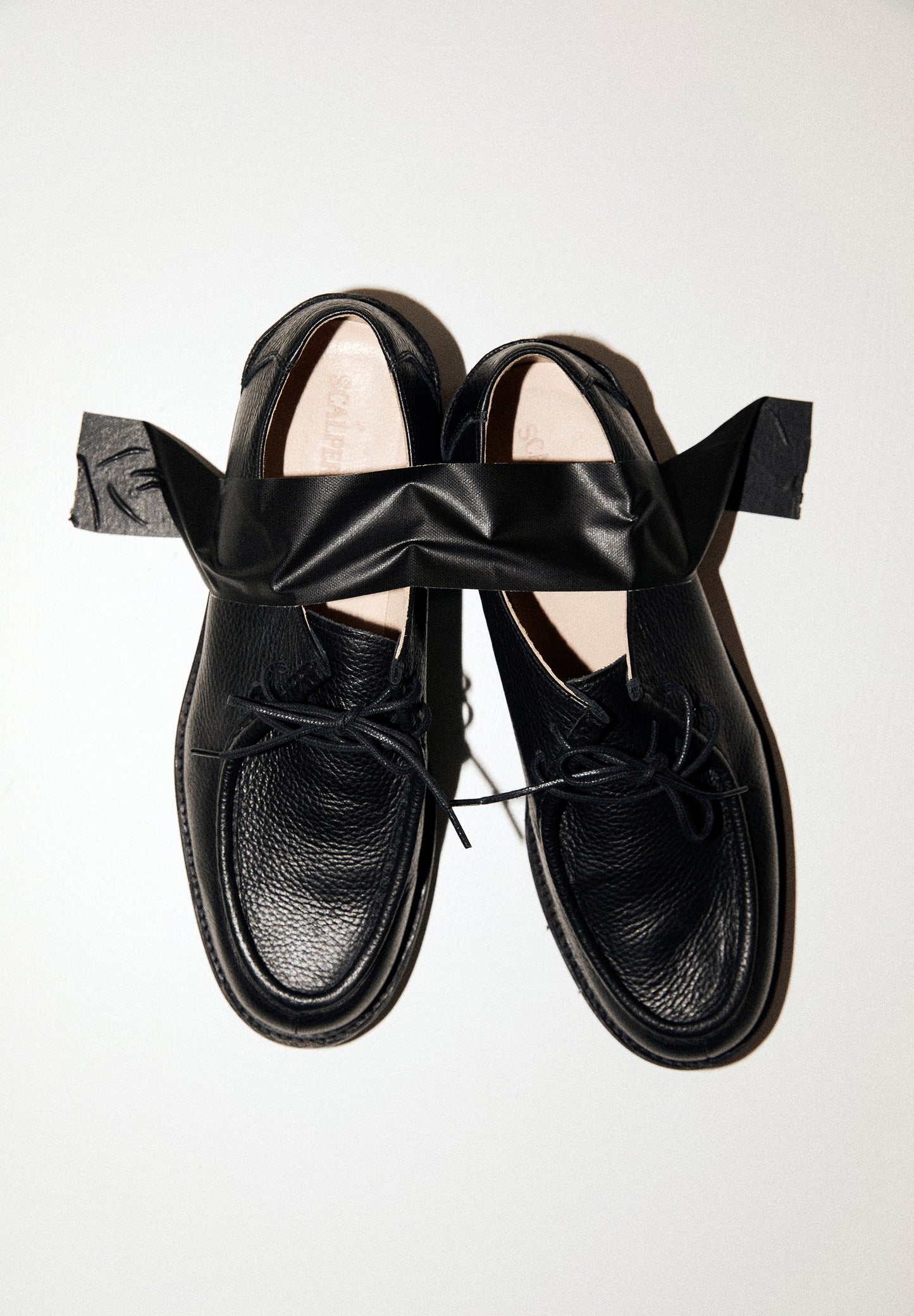 LEATHER SHOES WITH TRACK SOLES