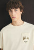 T-SHIRT MIT PRINT IN VERWASCHENER OPTIK