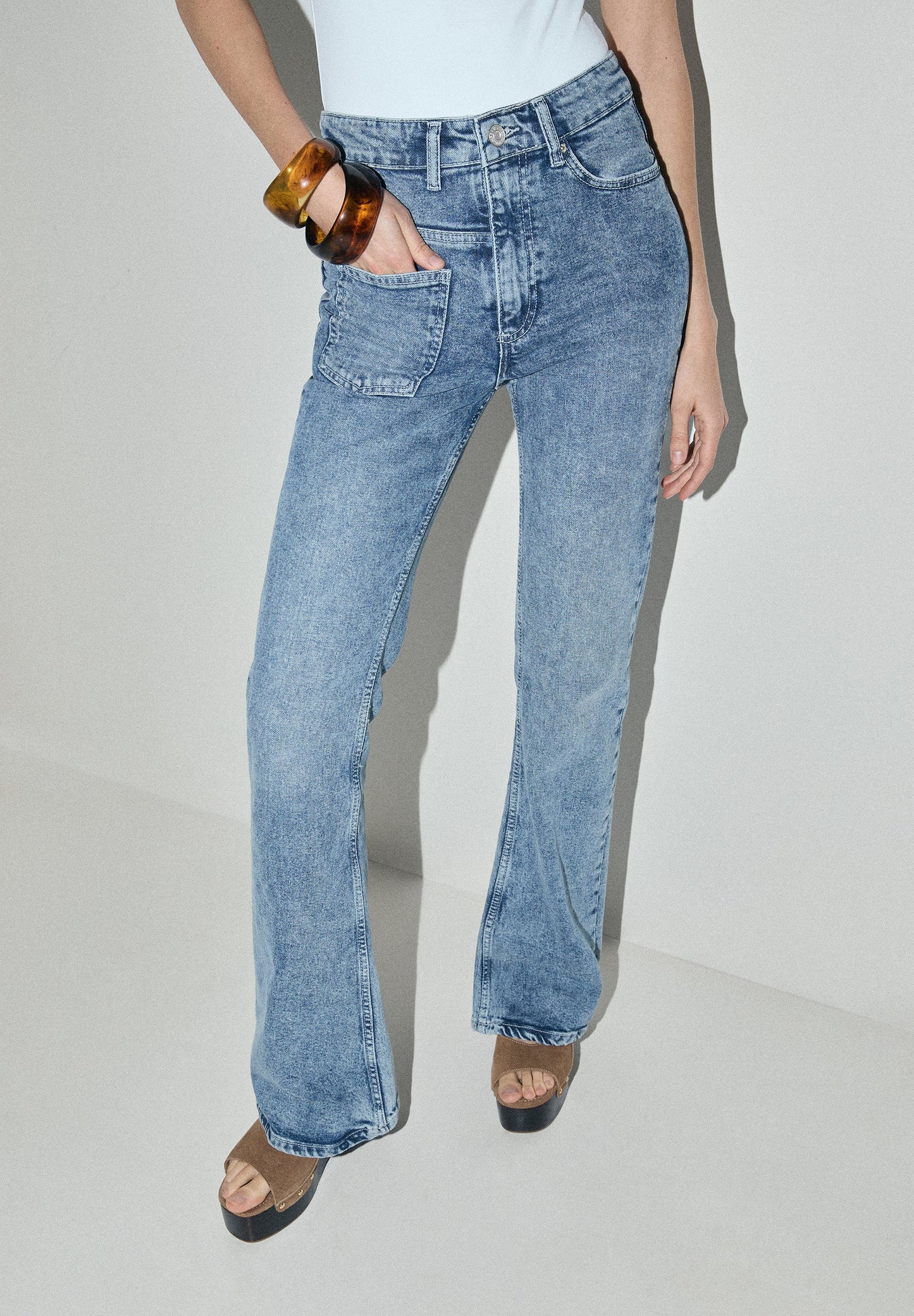 JEANS TASCA ASIMMETRICA