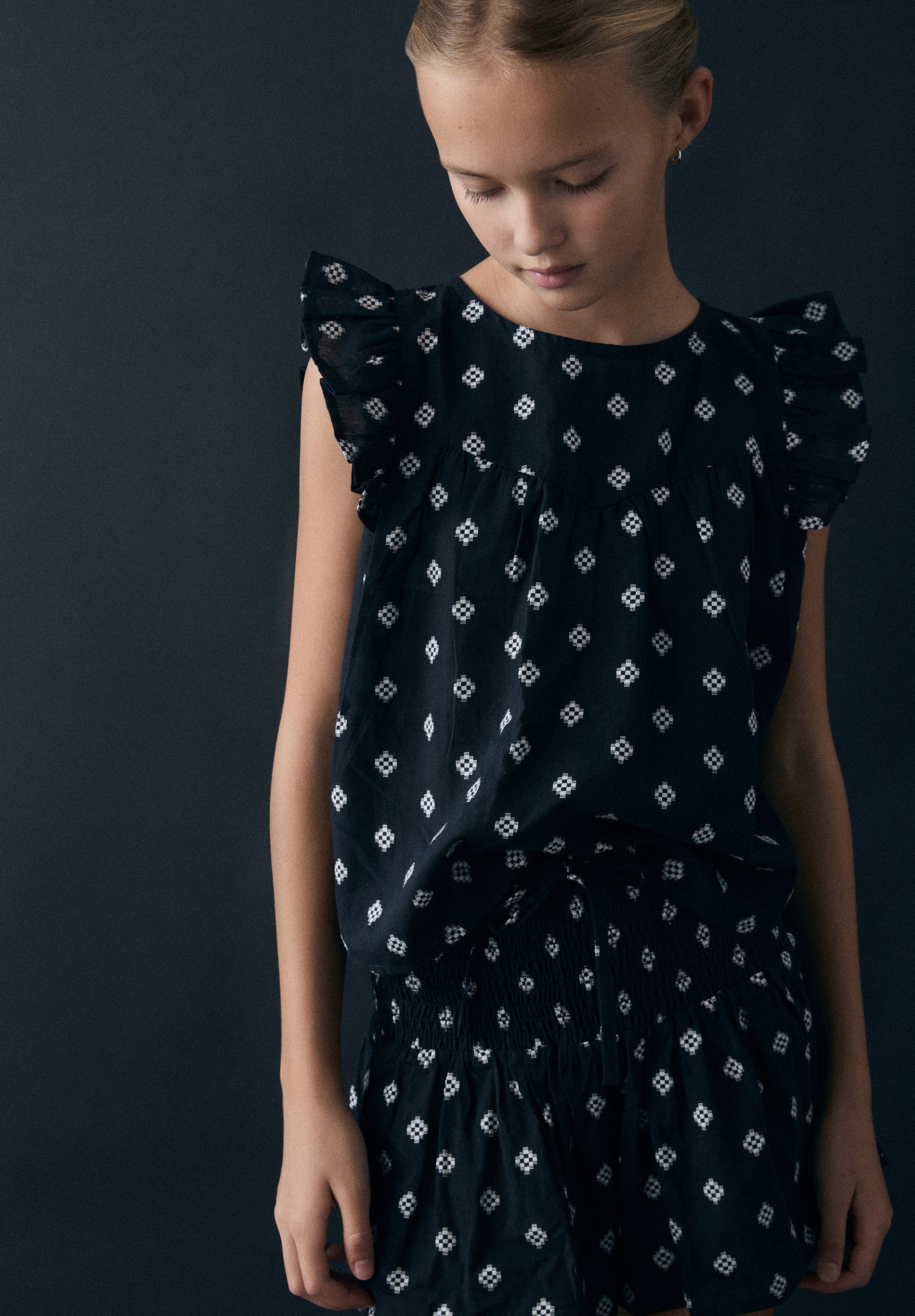 CAMICETTA JACQUARD SENZA MANICHE